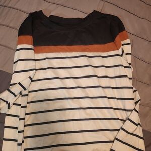 Women long sleeved shirt. Never worn.  Size Large